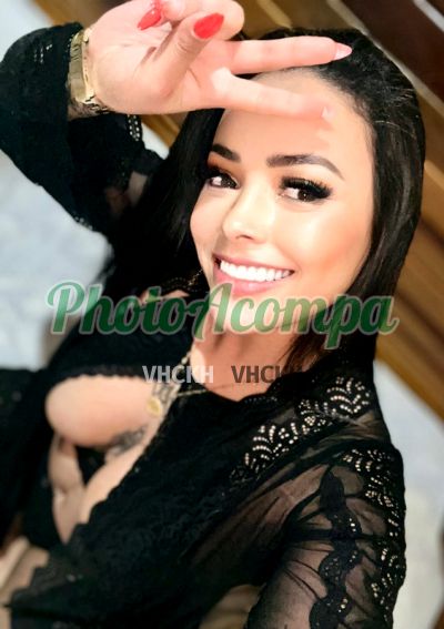 Morena, mulher que faz videochamadas e sexting