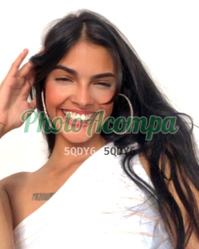 Taty, mulher que faz videochamadas e sexting