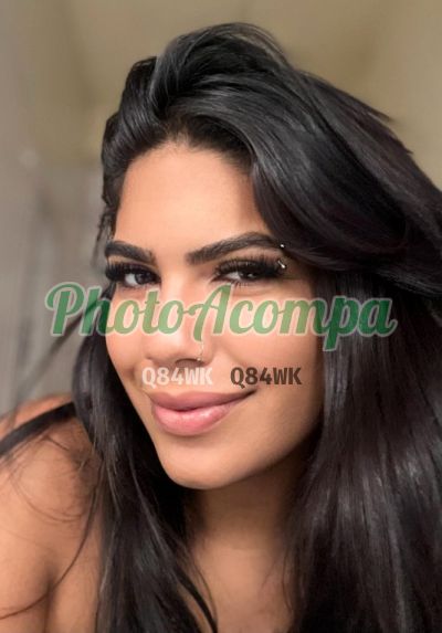 Morena, mulher que faz videochamadas e sexting