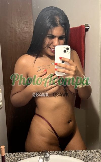 Morena, mulher que faz videochamadas e sexting