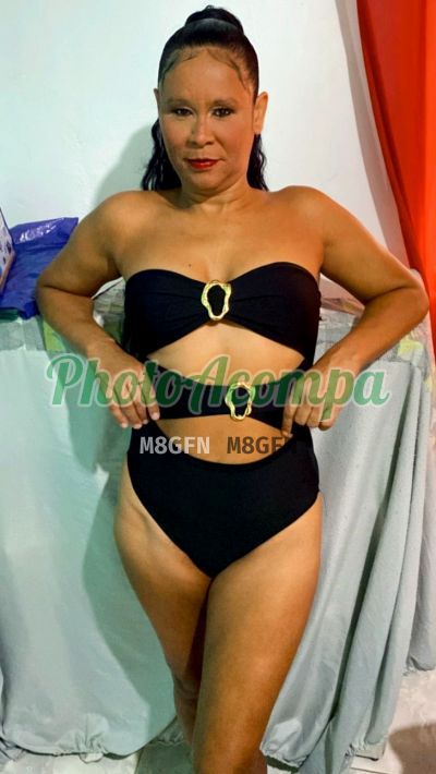 Bonizinha, mulher que faz videochamadas e sexting