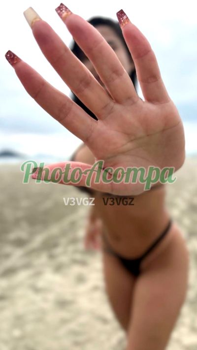 Nina, mulher que faz videochamadas e sexting