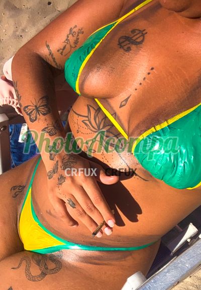 Melzinha, mulher que faz videochamadas e sexting